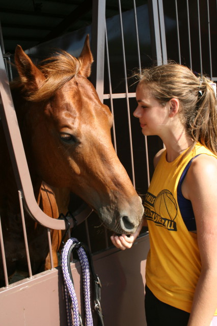 Meg Wilkening of River Falls, Wisconsin arrived at Roebke’s Run Friday to prepare for the next two days of horse trials in the Starter Division. Here she gives “Better Than A Boyfriend” some encouraging words.