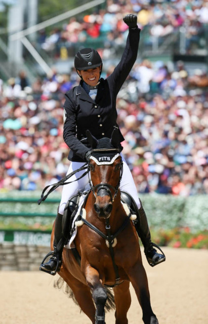 One K rider Laine Asker celebrates her stadium round with Anthony Patch. Photo by Rare Air Photography.