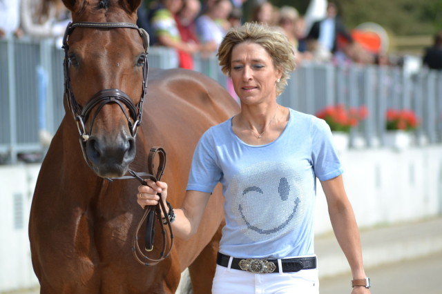 Overnight leader Ingrid Klimke and FRH Escada JS (GER) kick Sunday off with a wink and a smile. Photo by Leslie Wylie. 