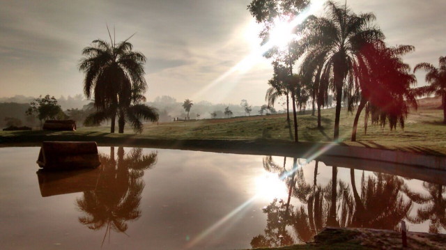 The sun setting over the cross country course at the Olympic Equestrian Centre. Photo by Gustavo Nascimento/FEI Photos.