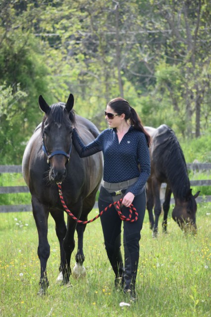 The Athletic Chaps fit smoothly over my breeches and paddock boots. The design includes articulation around the knees, which allows for full flexion...without any need for break in. Photo by Lorraine Peachey.