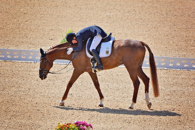 Sandra Auffarth gave Opgun Louvo a big hug after their leading test. This is what it's all about! #TwoHearts #JoinTheJourney Photo by Jenni Autry.